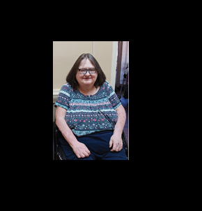 Morganfield Nursing and Rehab resident of the month, Jackie J. Pictured, smiling for photo.