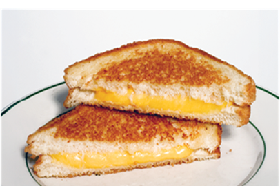 grilled cheese sandwich cut in two triangle slices